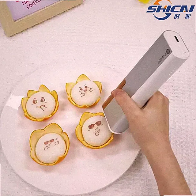 New handheld inkjet printer prints patterns, text, and numbers on food